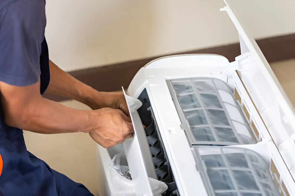 Home 13 Technician working on a quick AC fix in Orlando, FL home